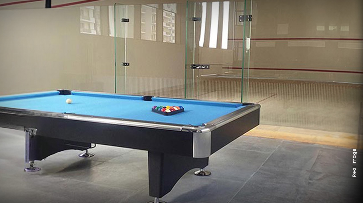 Billiards table and indoor glass-backed squash court at M3M Woodshire Sector 107